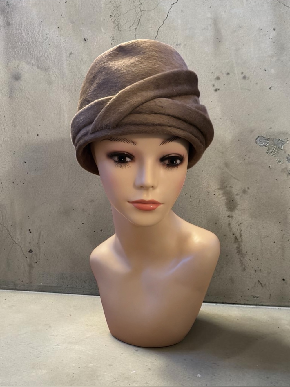 Vintage taupe wool-blend draped cloche hat features an elegant asymmetrical wrap